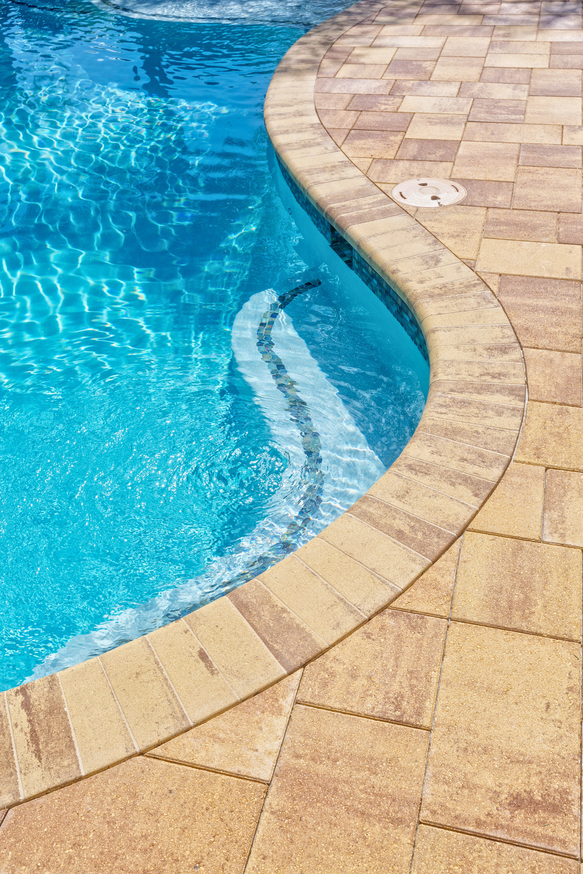 Clean swimming pool and surrounding deck
